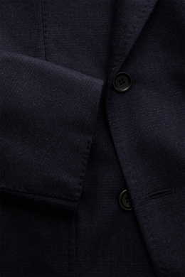 Close-up front view of the Stile Latino Suit 'Andrea' navy melange jacket, showing fine Prince-of-Wales pattern, button, and soft wool-cashmere texture.