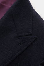 Close-up angled view of the Stile Latino Suit 'Andrea' navy melange jacket lapel showing subtle Prince-of-Wales pattern and fine wool-cashmere fabric.