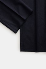 Close-up top view of navy melange fabric showcasing the subtle Prince-of-Wales pattern of the Stile Latino Suit 'Andrea'.