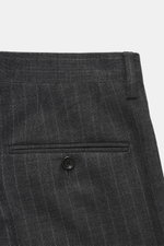 Close-up front view of the waistband and pocket of the Lardini Anthracite striped suit trousers, pure new wool with subtle check pattern.