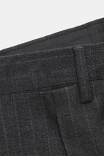 Close-up image of the waistband and fabric texture of the Lardini Anthracite striped suit trousers, showing the pure new wool material with a subtle check pattern, photographed from a top front perspective. The suit features a lightly textured feel, slim 