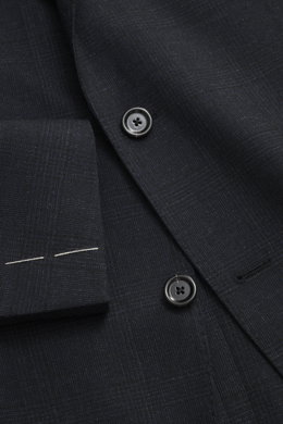 Close-up front view of the Lardini Suit dark navy melange showing pure new wool fabric with subtle check pattern, buttons, and tailored details.