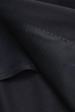 Close-up inside view of Tagliatore Suit 'Vesuvio' dark navy showing the soft virgin wool and cashmere blend fabric and fine stitching on the lining.