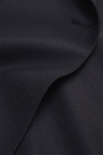 Close-up front angle of Tagliatore Suit 'Vesuvio' dark navy fabric, showing soft virgin wool and cashmere blend, double-breasted lapel details.