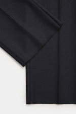 Close-up front view of Tagliatore Suit 'Vesuvio' dark navy fabric, showing soft virgin wool and cashmere blend texture.