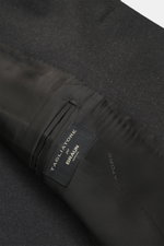 Close-up inside view of the Tagliatore Suit 'Vesuvio' anthracite melange showing soft virgin wool and cashmere blend lining with label, highlighting Italian tradition and elegant silhouette.