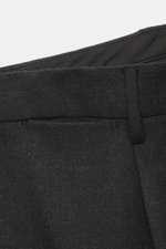 Close-up front view of the waistband and pocket detail of the Tagliatore Suit 'Vesuvio' anthracite melange, made from a soft virgin wool and cashmere blend, slim fit with classic tailored features.