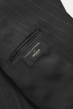 Close-up inside view of the Tagliatore Suit 'Vesuvio' anthracite striped showing black lining and label, highlighting Super 110's wool.