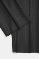 Close-up front view of the Tagliatore Suit 'Vesuvio' anthracite striped fabric showing soft Super 110's virgin wool with classic chalk stripes.
