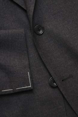 Close-up front view of Tagliatore Suit 'Vesuvio' dark grey melange showing tailored two-button jacket in soft Super 120's virgin wool with notched lapel, classic breast pocket, and unfinished sleeve cuffs.