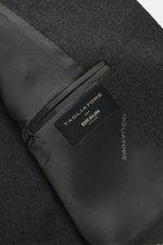 Close-up of the interior pocket and fabric texture from a top angle of the Tagliatore Suit 'Vesuvio' dark grey melange, crafted from Super 120's virgin wool with a soft touch and slim fit.