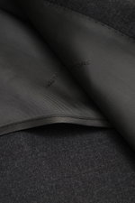 Close-up inside view of the Tagliatore Suit 'Vesuvio' dark grey melange showing soft Super 120's virgin wool lining and fabric texture.