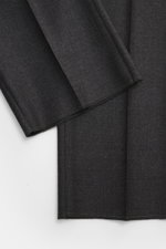 Close-up top-down view of Tagliatore Suit 'Vesuvio' dark grey melange fabric, pure Super 120's virgin wool with soft touch and slim fit.