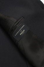 Close-up interior view of Tagliatore Suit 'Vesuvio' black showing the label and fabric texture, made from pure Super 120's virgin wool.