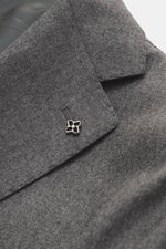 Close-up front view of the lapel and pin detail on the Tagliatore Suit 'Vesuvio' grey melange made from Super 110's virgin wool.