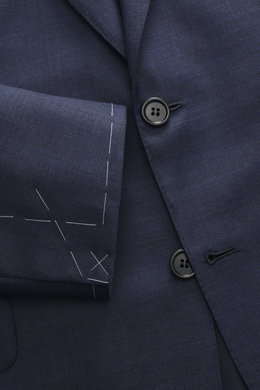 Close-up front view of Brioni Suit 'Brunico' navy melange jacket showing two-button style, notched lapel, and smooth pure wool fabric.