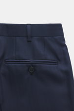 Navy wool-silk blend trousers of the Brioni Suit 'Brunico' navy shown from the back, featuring buttoned back pockets and belt loop.