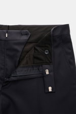Close-up front view of the Tagliatore Tuxedo 'Napoli' dark navy trousers showing the zip, hook fastener, satin waistband, and button detailing in pure Super 110'S virgin wool.

Italian eveningwear to meet the dress code: Draw attention to yourself in styl