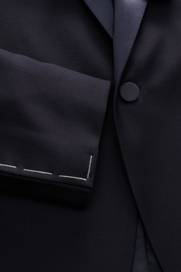 Close-up front view of the Tagliatore Tuxedo navy showing the slim fit, one-button jacket in pure Super 110'S virgin wool with satin lapel.