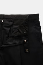 Tagliatore Tuxedo black trousers close-up from front showing waistband, zipper, hook fastener, and button details in pure Super 110'S wool.