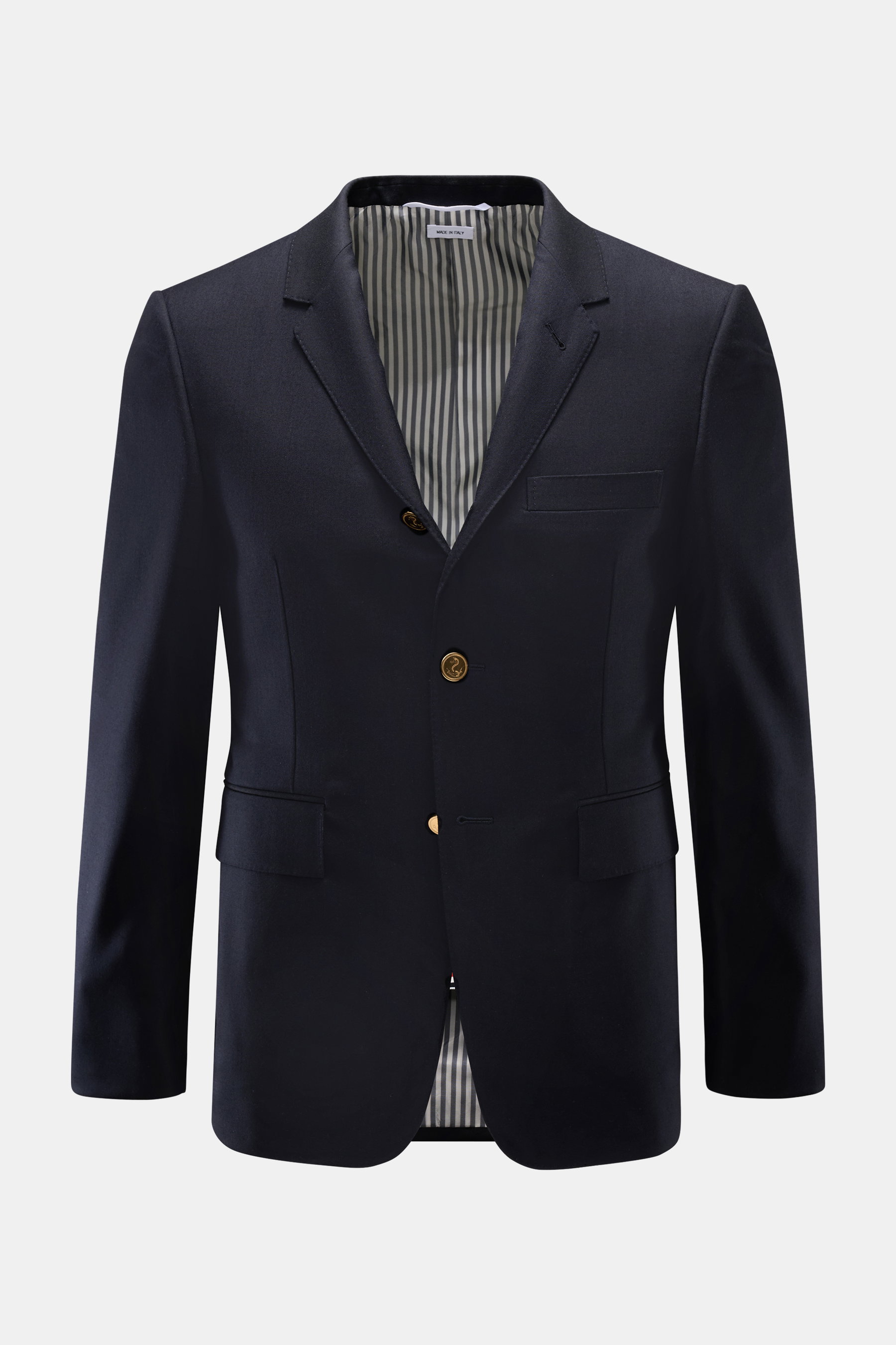 Thom Browne Sakko navy, frontale Ansicht, tailliert, drei Knöpfe goldfarben, reine Wolle, fallendes Revers, Brust- und Hüfttaschen, Innenfutter gestreift.
