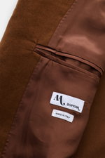 Doppiaa Sakko 'Aaradeo' braun halb gefüttert, Innenansicht des Baumwoll-Fleece mit Innentasche und Label, Detailaufnahme.