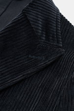 Close-up front top view of the Doppiaa Corduroy smart-casual jacket 'Aansonia' navy, featuring corduroy made of cotton, slim fit, double breasted three-button style, pointed lapel, patch hip pockets, sleeve cuff with concealed button, side vents at the ba