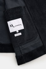 Close-up image from above of the Doppiaa Corduroy smart-casual jacket 'Aansonia' navy showing cotton corduroy fabric, slim fit, double breasted three-button style, pointed lapel, patch hip pockets, sleeve cuff with concealed button, side vents at the back