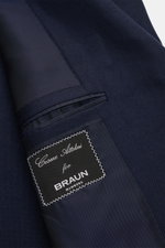 Close-up inside view of Cesare Attolini Cashmere smart-casual jacket navy showing label, pocket, and fine pure cashmere fabric texture. 

<p>Enjoy luxury from CESARE ATTOLINI: This timeless smart-casual jacket in the finest pure cashmere has been made exc