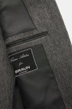 Close-up inside view of the Cesare Attolini Cashmere jacket grey mottled showing the black lining, label, and inner pocket details.

<p>Enjoy luxury from CESARE ATTOLINI: This timeless smart-casual jacket is made in Italy from the finest pure cashmere – a