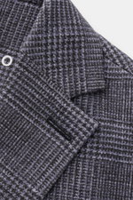 Close-up angled view of the Circolo 1901 Jersey smart-casual jacket anthracite/light grey checked, showing its glen check print fabric and soft jersey texture.

<p>CIRCOLO 1901 has used a lightweight design for this soft jersey smart-casual jacket in cott