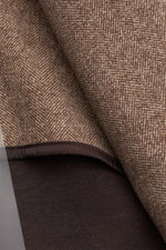 Close-up view of the fabric and lining of the Circolo 1901 Jersey jacket beige/dark brown patterned, showing its woven look print and soft texture.

Description: <p>This easy-care, modern jersey jacket in a contemporary unconstructed design with woven loo