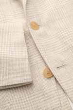 Close-up front view of the Belvest Smart-casual jacket cream/beige checked showing fabric texture, buttons, and subtle glen check pattern.

<p>BELVEST has brought together the best in natural materials – wool, linen, silk and cashmere – in this summery sm