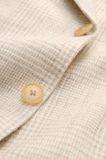Close-up front detail of the Belvest Smart-casual jacket cream/beige checked showing button and subtle glen check pattern.

<p>BELVEST has brought together the best in natural materials – wool, linen, silk and cashmere – in this summery smart-casual jacke