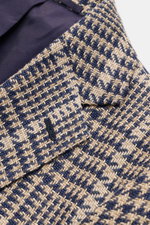 Close-up front angle of Stile Latino Smart-casual jacket 'Vincenzo' navy/beige checked showing textured silk blend fabric and lapel details.

<p>STILE LATINO presents luxury you can feel with its lightweight smart-casual jacket 'Vincenzo' in a fine silk b