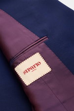 Close-up inside view of the Sipario Smart-casual jacket 'Ivan' dark blue showing the purple striped lining with a beige Sipario Napoli label, highlighting its soft, pure wool fabric and smart design details.