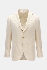 Borrelli Sakko 'Procida' creme, Slim Fit, taillierter Drei-Knopf-Stil, fallendes Revers, Brusttasche, Hüfttaschen, halb gefüttert, leichte Leinen-Seide-Baumwolle-Struktur, frontale Nahaufnahme.