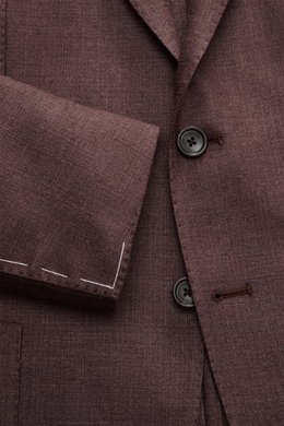 Nahaufnahme des dunkelbraun melierten Tagliatore Sakko 'Monte Carlo' mit feinem Strukturgewebe, Slim Fit, fallendem Revers und zwei Knöpfen.
