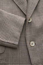 Brunello Cucinelli Sakko beige/dunkelbraun kariert, Slim Fit, Drei-Knopf-Stil, Glencheck, Knöpfe, Ärmelsaum, Detailaufnahme frontal.
