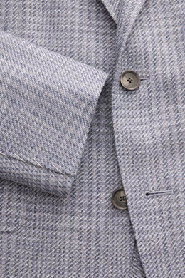 Close-up front view of Caruso Smart-casual jacket 'Aida' grey/smoky blue checked with buttons and linen-wool glen check fabric.

Description: <p>A stylish addition with a classic feel: Made of a lightweight linen-wool blend with timeless glen check, the s