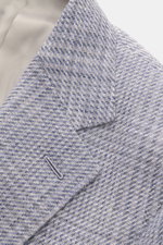 Close-up front-angle view of Caruso Smart-casual jacket 'Aida' grey/smoky blue checked with step lapel, classic glen check, and linen-wool blend fabric. 

Description: 
<p>A stylish addition with a classic feel: Made of a lightweight linen-wool blend with