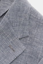 Close-up view of the lapel and upper sleeve of the Zegna Smart-casual jacket 'Riviera' dark navy/white mottled showing fine weave texture.

Description: <p>The smart-casual jacket 'Riviera' by ZEGNA made of linen and wool with silk content has a comfortab