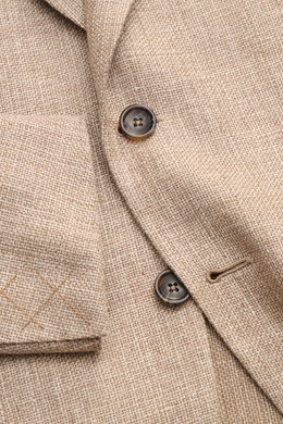 Nahaufnahme des Zegna Sakko taupe meliert aus Leinen, Wolle und Seide mit feinem Strukturgewebe, Slim Fit, zwei Knöpfen und Brusttasche.