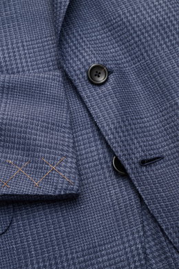 Close-up front view of the Zegna Smart-casual jacket 'Atelier' navy/smoky blue checked showing the glen check pattern, black buttons, and orange sleeve stitching.

<p>A statement piece for the most discerning tastes: The 'Atelier' smart-casual jacket by <