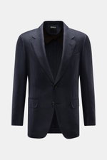 Front view of the Zegna Smart-casual jacket dark navy in cashmere, silk, and linen blend with a slim fit, two-button style, step lapel, breast pocket, flap hip pockets, unfinished cuffs, and side vents.

<p>The two-button smart-casual jacket by ZEGNA made