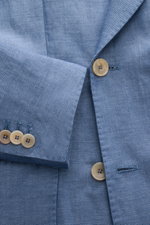 Santaniello Smart-casual jacket grey-blue mottled shown close-up from above, highlighting soft wool-linen fabric, buttons, and slim fit details. Classic elegance for the new season: This double-breasted smart-casual jacket by SANTANIELLO in fine wool with