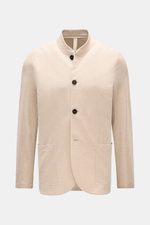 Front view of Harris Wharf London Knit blazer beige made from pure cotton piqué with a slim fit, four-button style, open edge finish, patch hip pockets, two inside pockets, slim standing collar, and unlined design.