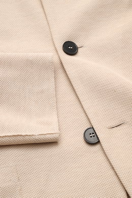 Close-up top view of Harris Wharf London Knit blazer beige showing pure piqué cotton fabric, black buttons, and patch pocket detail. 

Description: <p>HARRIS WHARF LONDON has chosen a high-quality cloth from Loro Piana for this relaxed knit blazer. Pure c