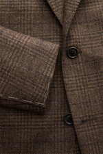 Corneliani Sakko graubraun kariert aus Wolle-Cashmere-Mix, Slim Fit, tonales Prince-of-Wales Muster, Detailaufnahme von Knopf und Revers.