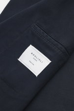 Close-up interior view of the navy Boglioli Blazer 'K. Jacket' showing the tonal herringbone fabric, inner pocket, and white brand label.

<p>Ideal for business and leisure: With the simple unconstructed blazer 'K. Jacket' from BOGLIOLI made of soft cotto